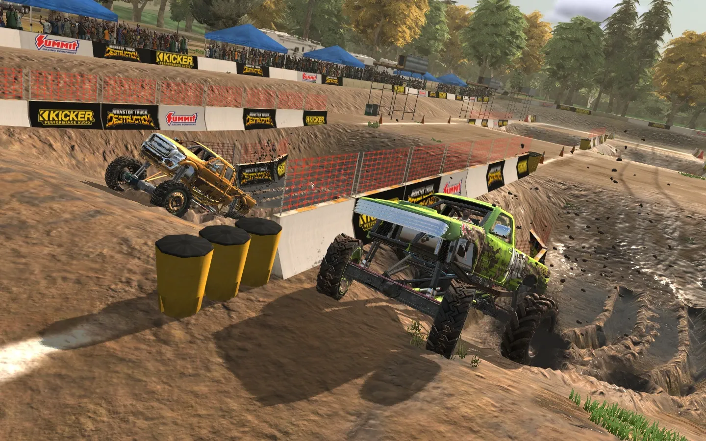Two trucks racing a mud drag