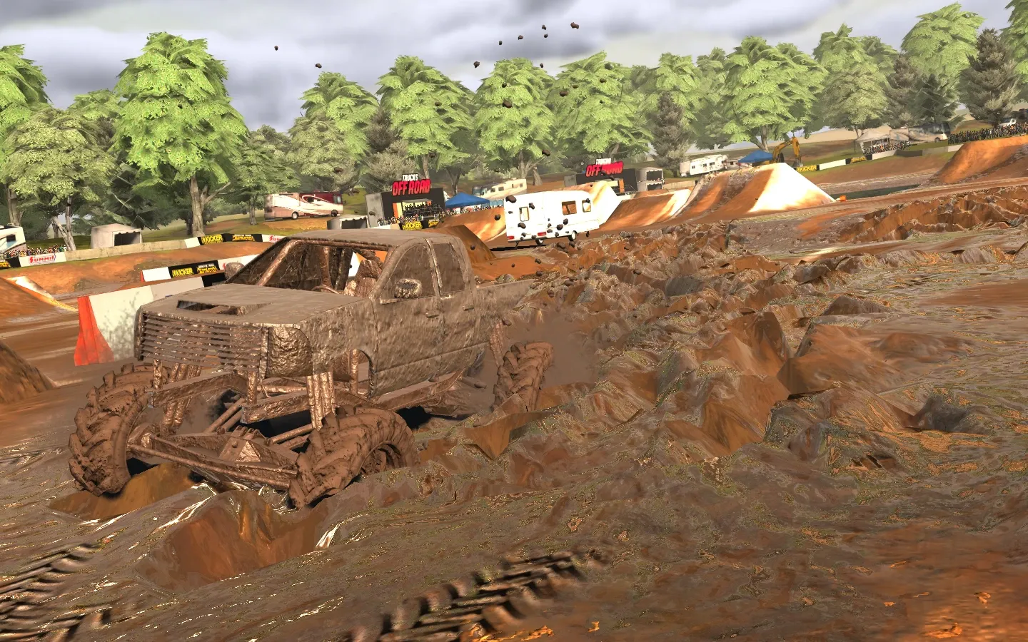 Truck buried in a mud bog